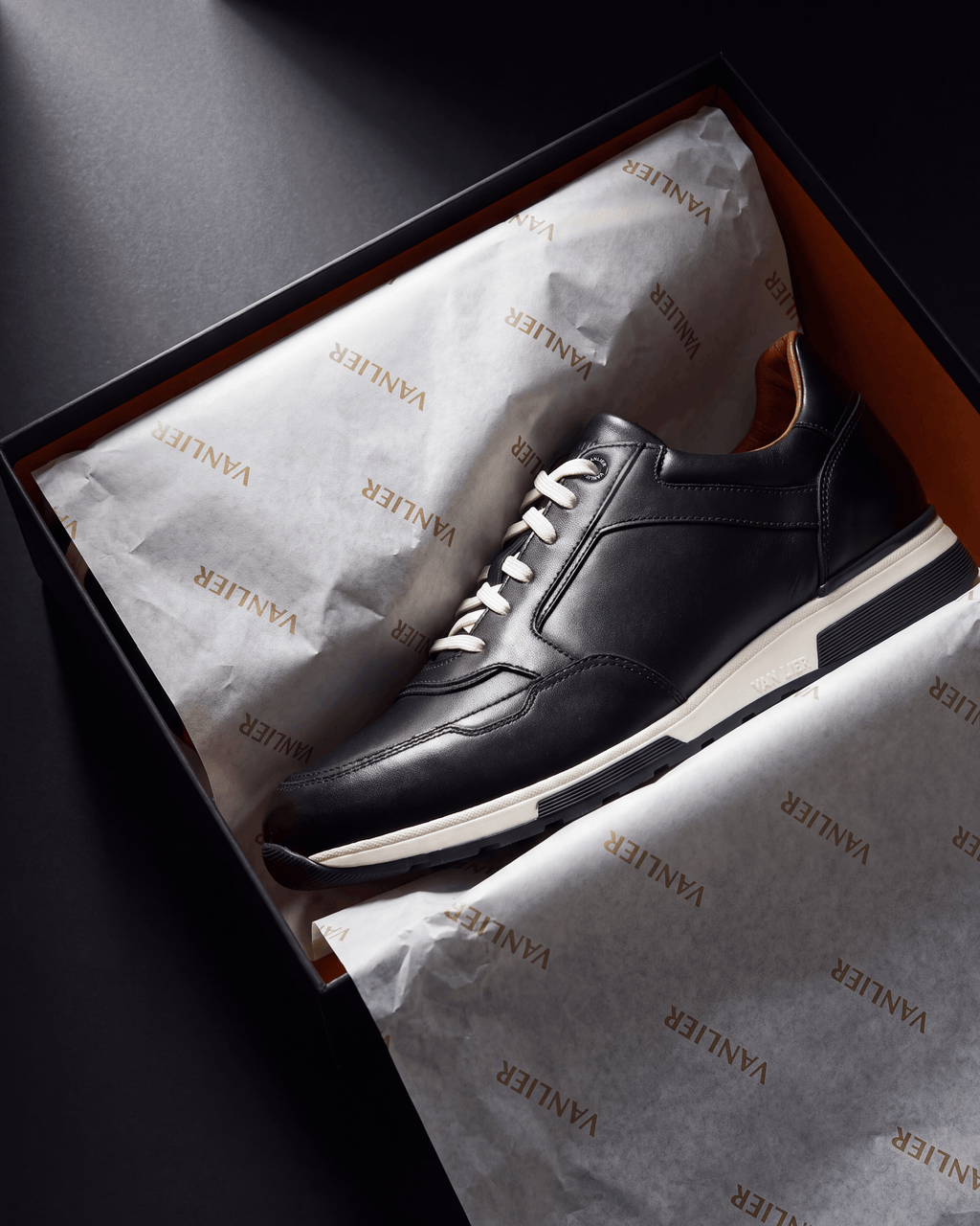 Zwart gladleren Positano sneaker – in de doos met vloeipapier
