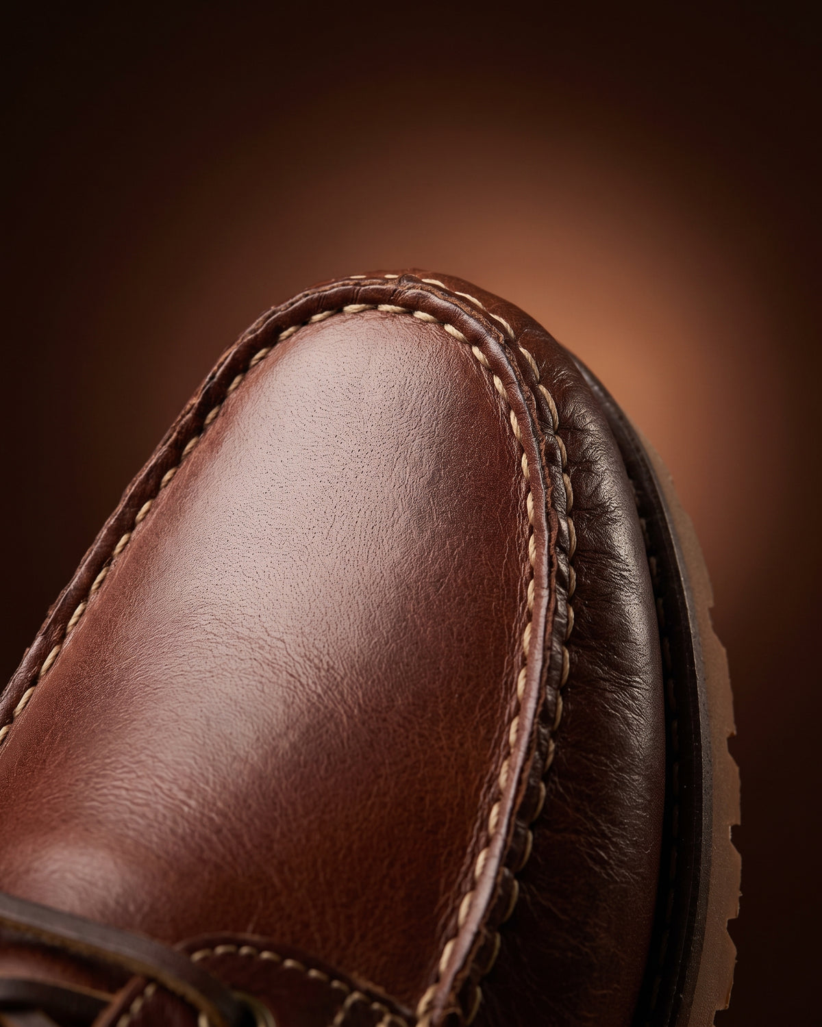 Bruin gladleren Baylands boot – macro-detail van het paar