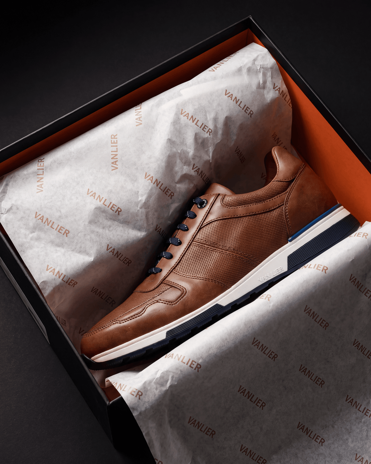 Cognac gladleren Positano sneaker – in de open schoenendoos