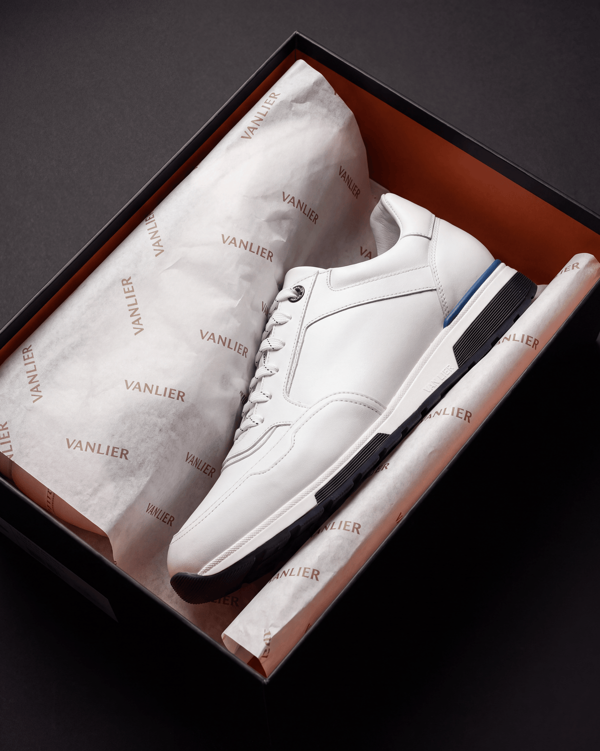 Wit gladleren Positano sneaker – in de open schoenendoos